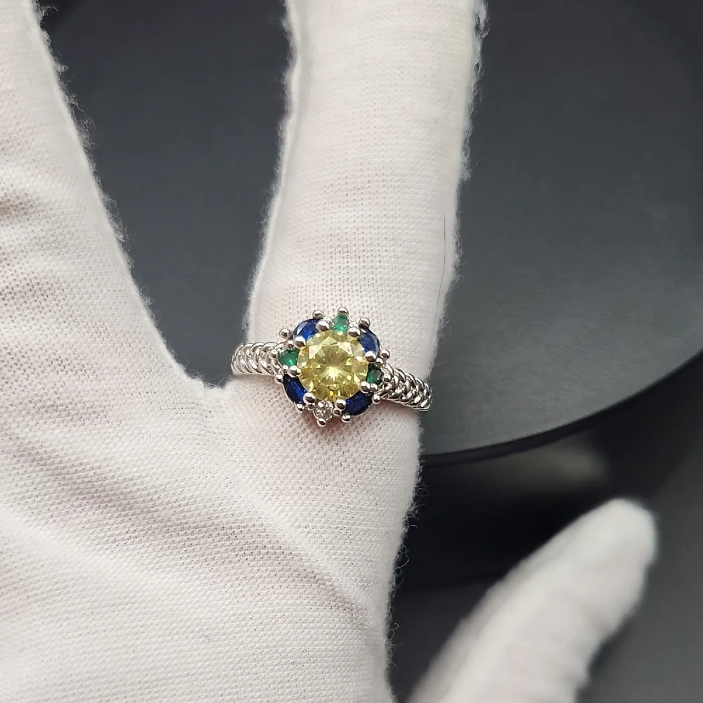 Elegant Silver Ring with Yellow and Blue Stones